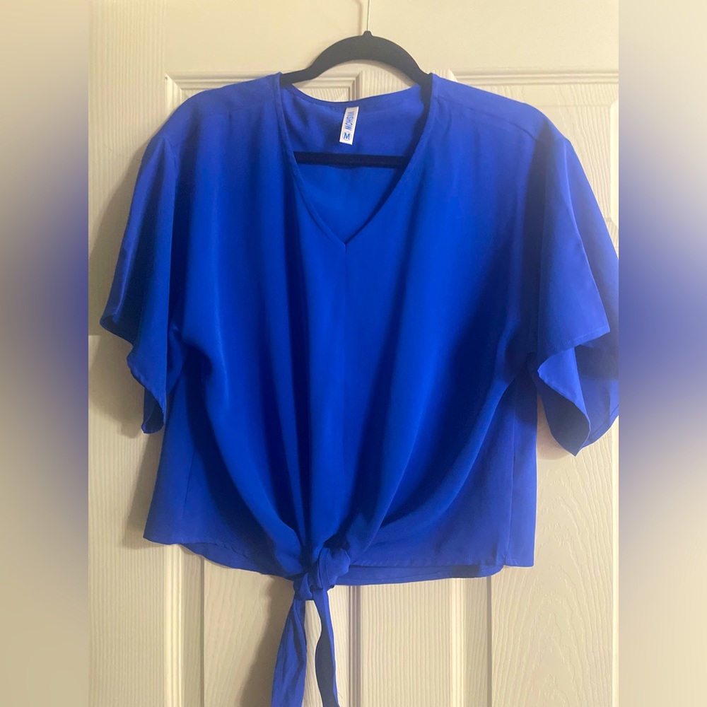 Royal blue top. Never worn. Cute for work or play